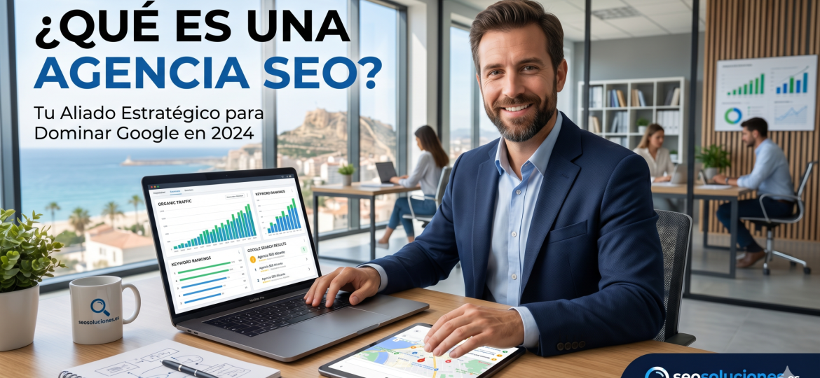 IMAGEN ¿QUÉ ES UNA AGENCIA SEO?. Enseña un profesional sentado en su mesa con su ordenador abierto.
